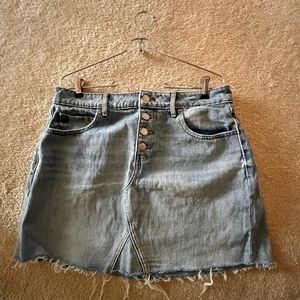 Old Navy brand jean skirt. Size 12. Washed denim, button front.